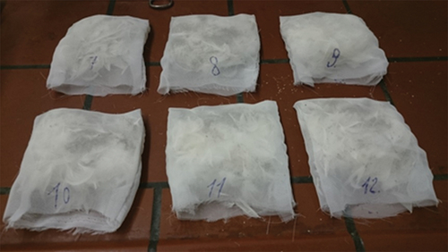 Figure 2. Composite pillows made from loose feathers and sepiolite in PET fabric.