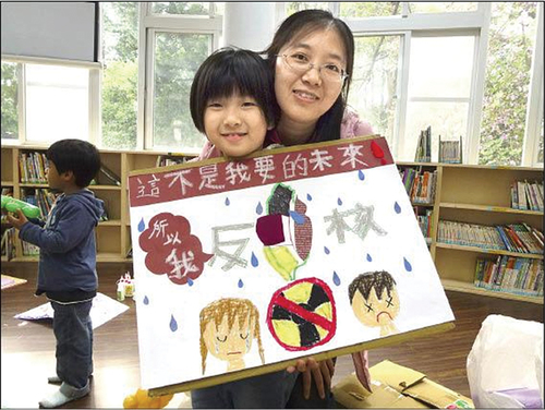 Figure 7. A girl with her anti-nuclear poster.