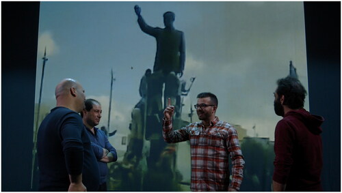 Figure 1 Discussing the first day of the revolution. (From Our Memory Belongs to Us (Citation2021), directed by Rami Farah; © Final Cut for Real).
