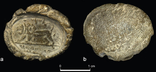 Fig. 2: The bulla, ‘(belonging) to ShemaꜤ servant of Jeroboam’; a) face; b) back (photos by Y. Goren)