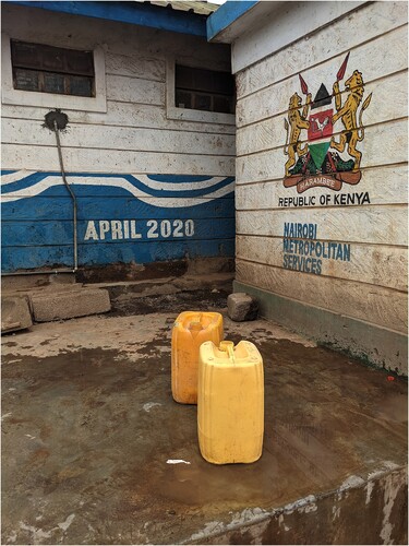 Figure 1. Two jerry cans at a newly erected borehole in Silanga, Kibera (2021), picture taken by the author.