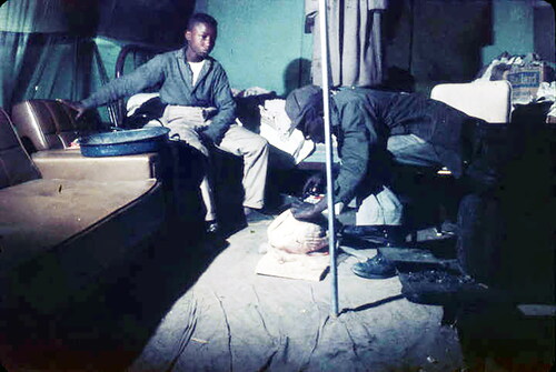 Figure 2. Roosevelt Scott and his father prepare a holiday meal inside their family’s tent in Lowndes County, Alabama. Credit: Alabama Department of Archives and History.