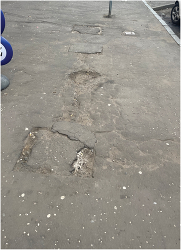 Figure 2. A poorly maintained pavement regularly used by pedestrians (2).