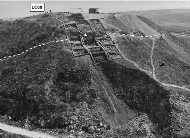 Fig. 3: The Assyrian siege ramp and Area R in 1983, view from the southwest (based on Ussishkin Citation2004a: 705, Fig. 13.10); the location of the Outer Revetment Wall is marked by a dashed white line