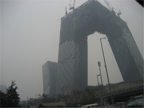 Figure 8. Building a new Beijing on a hazy day (2008). Photo by Gladys Pak Lei Chong.