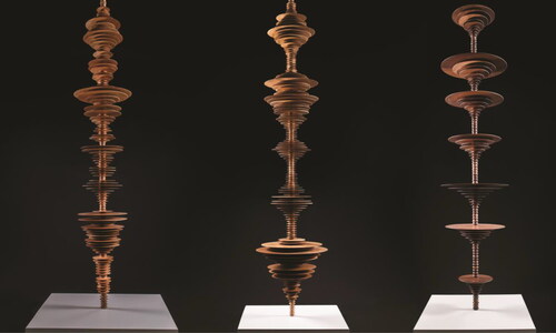 Figure 3. A selection of wooden sculptures from artist Elizabeth Turk’s (2020) series Tipping Point: Echoes of Extinction, Hirschl & Adler Modern Gallery. Each sound column represents the calls of an extinct, endangered, or recovering species—here (from left to right), brown pelican, bald eagle, and ivory-billed woodpecker. Image courtesy of the artist.