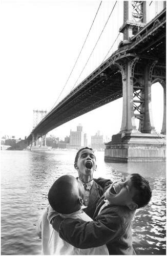 Figure 18 Unknown photographer, ‘Familiar sights to the three boys as they play along the docks of the East River are the Manhattan Bridge and the Brooklyn waterfront shown in the background’. ‘We Three’, 1964. USIA ‘Picture Story’ Photographs, 1955–84, Record Group 306. 306-ST-837-64-356.
