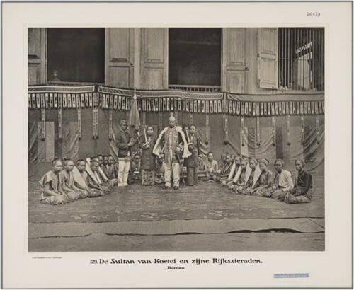 Figure 1. Sultan Aji Muhammad Sulaiman of Kutai, Kalimantan, pictured with his regalia and attendants, 1910. Image in the public domain, Leiden University Library Digital Collections: <http://hdl.handle.net/1887.1/item:922096>
