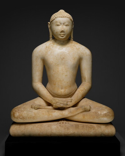 Jain Svetambara Tirthankara in Meditation (artist unknown—India/Gujarat or Rajasthan), 11th century. Marble, H. 39 in. Courtesy of the Metropolitan Museum of Art, New York, purchase, Florence and Herbert Irving Gift, 1992. Accession Number: 1992.131.
