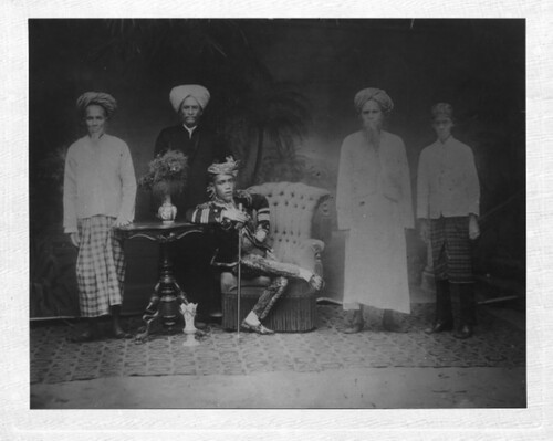 Figure 4. Hadji Bandahali, Hadji Omar, the sultan of Sulu Badaruddin II, Hadji Samla, and Samania, the son of Hajdi Omar, posing in a studio (SOAS, PP MS 26/3/1/1).