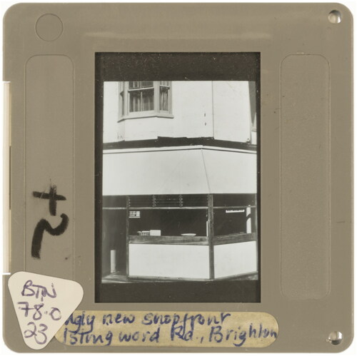 Figure 9. ‘Ugly New Shop Front, Islingword Road, Brighton’, undated 35mm slide, photographer unknown, former University of Brighton slide library, collection of Annebella Pollen. Photograph by Rachel Maloney, 2021.