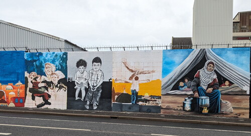 Figure 7. Image of a new mural of solidarity in progress in Belfast.Source: Photo taken by Brendan Ciarán Browne, 2024.